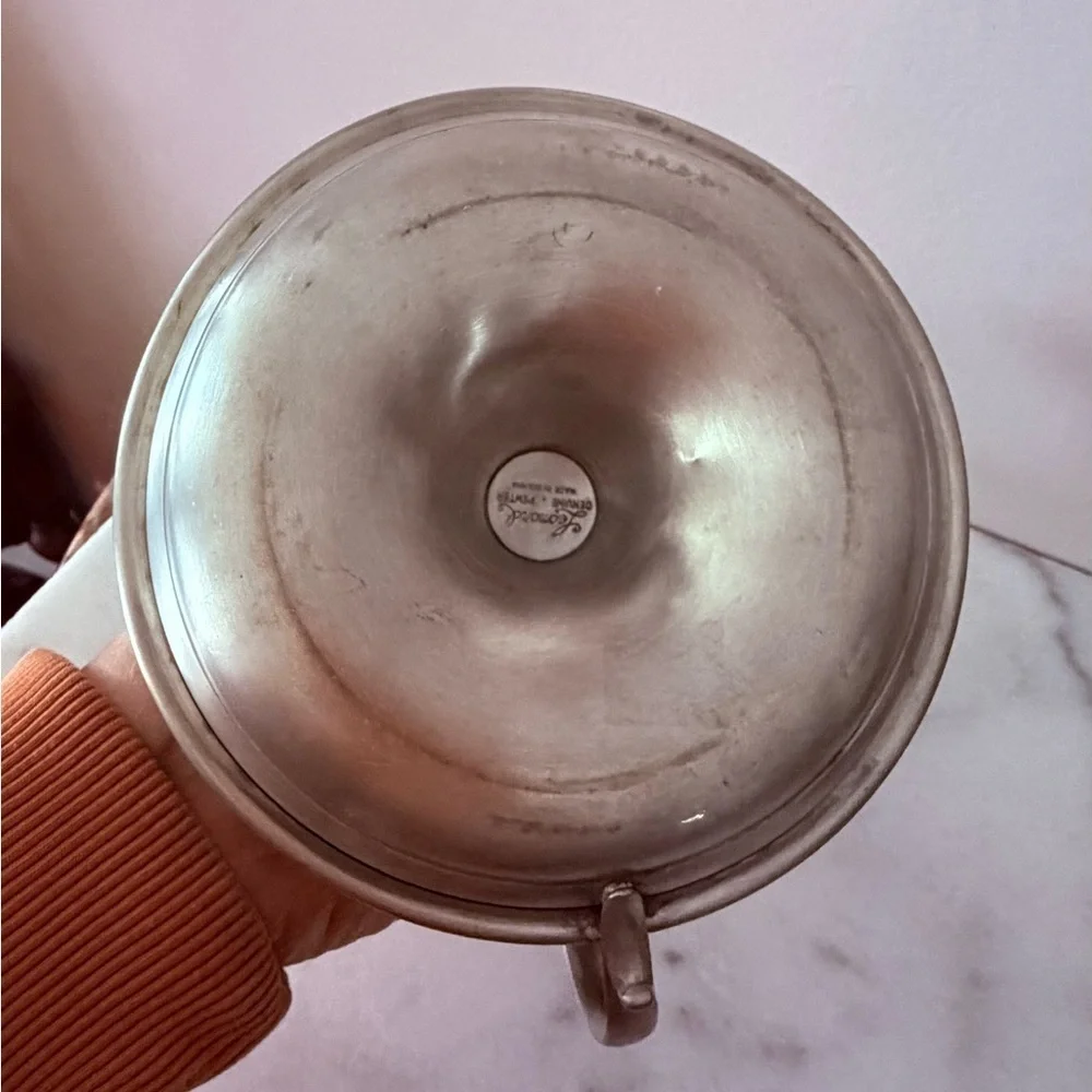 an Early American Pewter by Web chamberstick candle holder